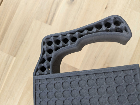 Rear of casing with rugged texture and ergonomic handle